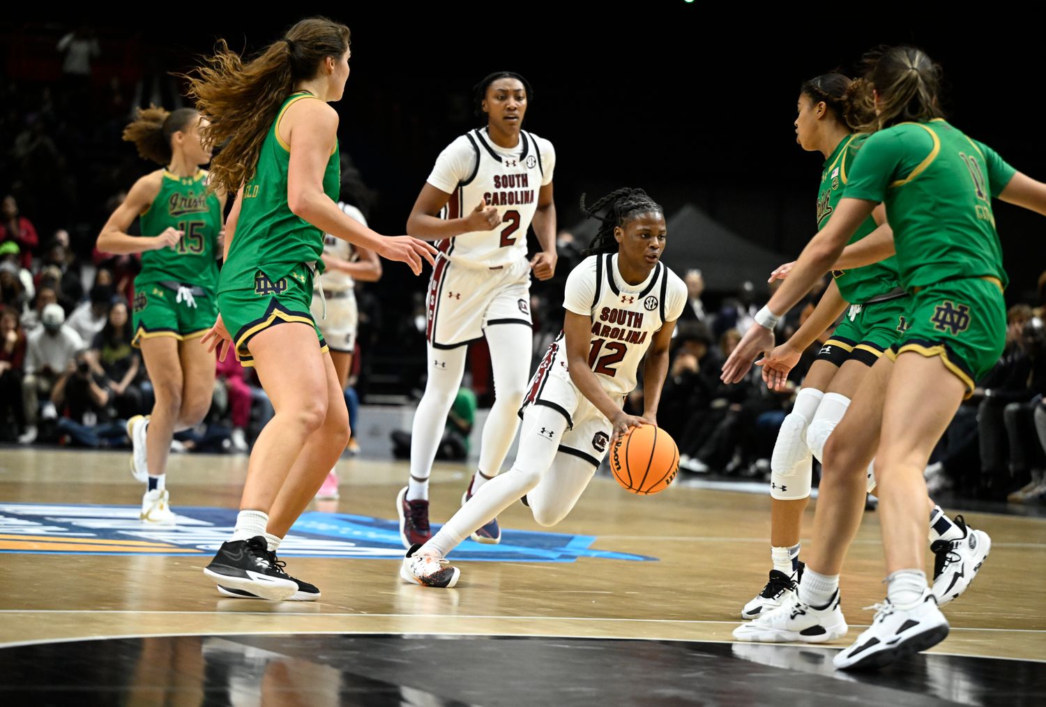 MiLaysia Fulwiley driving to the basket against multiple Notre Dame defenders (6th Nov., 2023)